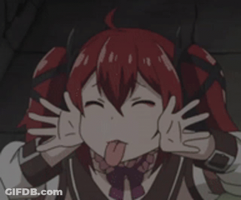 A Girl With Red Hair Is Making A Funny Face With Her Tongue Out . GIF