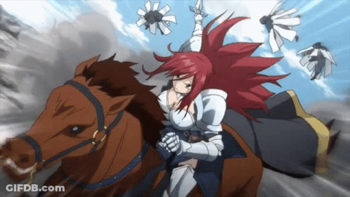 A Girl With Red Hair Is Riding A Horse GIF
