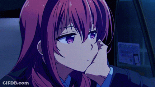 A Girl With Red Hair Is Sitting In A Car With A Phone Sticker On The Window GIF