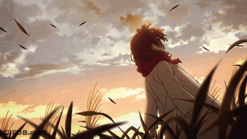 A Girl With Red Hair Is Standing In A Field Of Tall Grass Looking Up At The Sky GIF