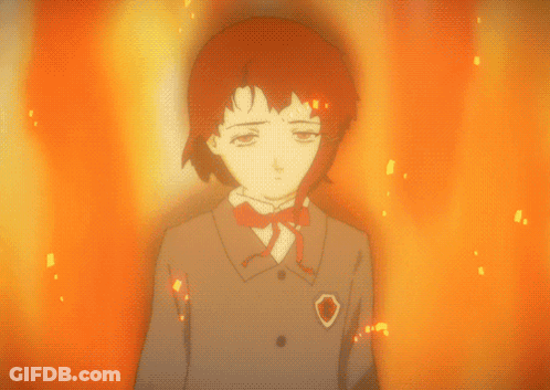 A Girl With Red Hair Is Standing In Front Of A Fire Background GIF