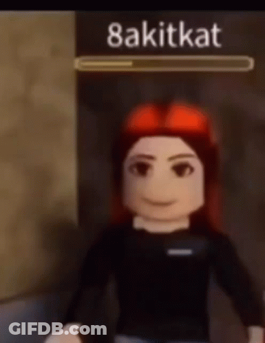 Girl With Red Hair In Front Of 8Akitkat Sign GIF