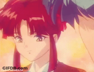 A Girl With Red Hair Is Standing Next To A Boy With Blue Hair And The Words Sugarhounddust On The Bottom GIF