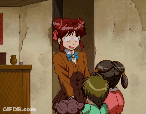 A Girl With Red Hair Is Standing Next To Two Other Girls In A Room GIF