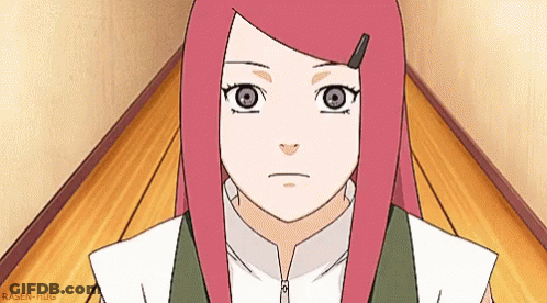 A Girl With Red Hair Is Standing On A Wooden Floor In A Room . GIF