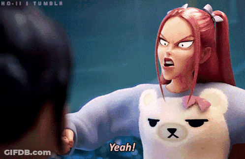 A Girl With Red Hair Is Wearing A Teddy Bear Sweater And Yelling Yeah GIF