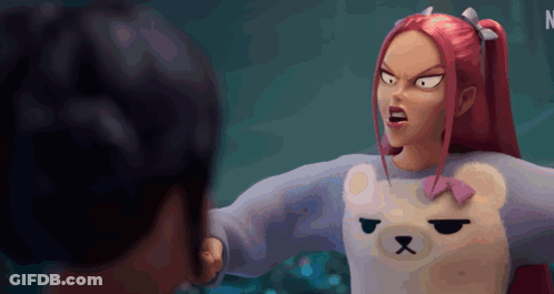 A Girl With Red Hair Is Wearing A Teddy Bear Sweater With A Bow On It GIF