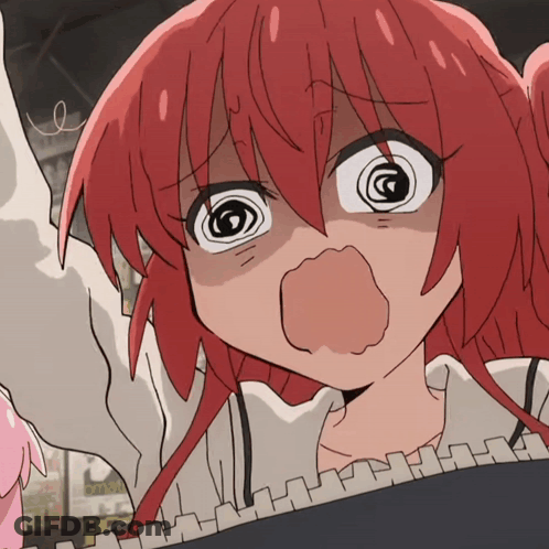 A Girl With Red Hair Making A Funny Face GIF