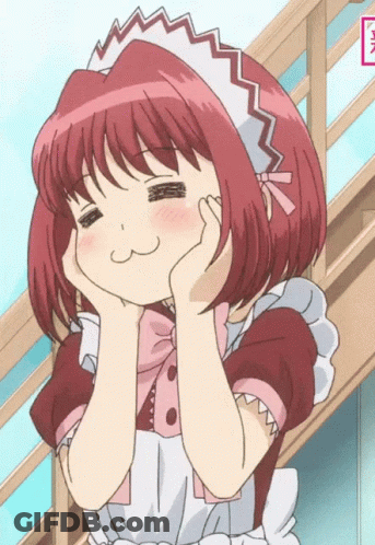 A Girl With Red Hair Wearing A Maid Outfit GIF