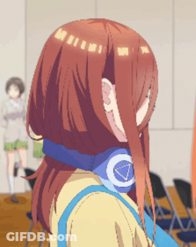 A Girl With Red Hair Wearing Headphones With A C On Them GIF