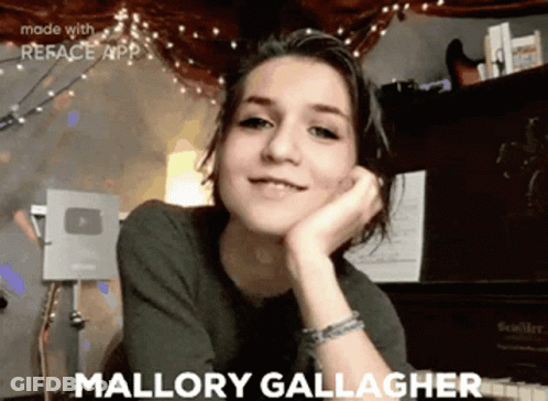 A Girl With The Name Mallory Gallagher Written On Her Face GIF