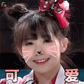 A Girl With Two Buns On Her Head And A Cat Face On Her Face GIF