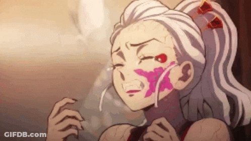 A Girl With White Hair And A Pink Flower On Her Face Is Crying In A Cartoon . GIF
