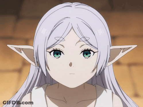 A Girl With White Hair And Elf Ears Has A Serious Look On Her Face GIF