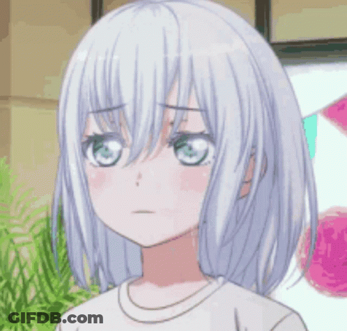 A Girl With White Hair And Pink Cheeks Is Making A Funny Face With Her Eyes Closed . GIF