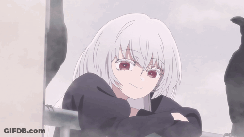 A Girl With White Hair And Red Eyes Looks At The Camera GIF