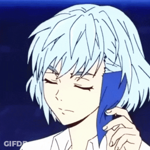 A Girl With White Hair Is Holding A Blue Object In Her Hand . GIF