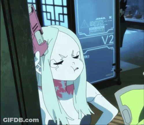 A Girl With White Hair Stands In Front Of A Screen That Says V2 GIF