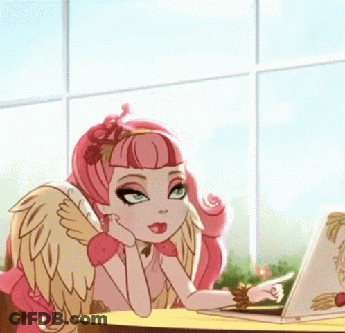 A Girl With Wings Is Sitting At A Table With A Laptop And Pointing At It GIF