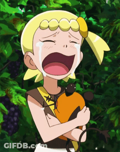 A Girl With Yellow Hair Is Crying While Holding An Orange Animal GIF