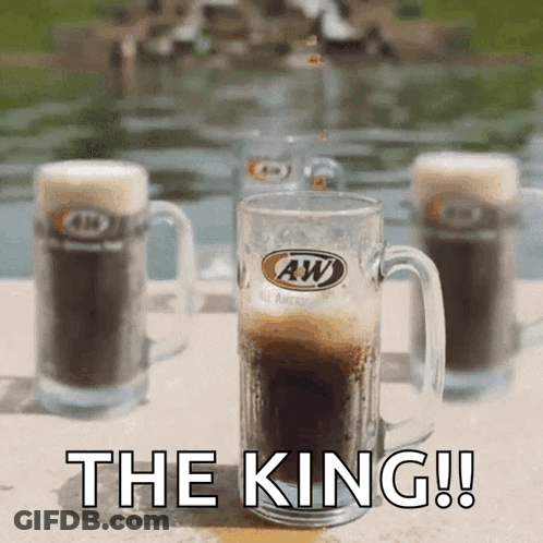 A Glass Of A&w Beer With The Words The King Written Below It GIF