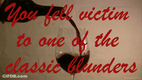A Glass Of Red Wine With The Words " You Fell Victim To One Of The Classic Blunders " GIF