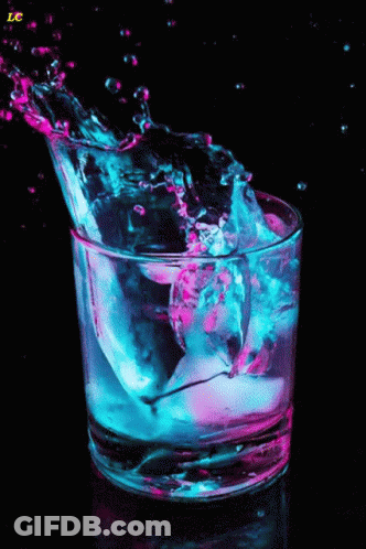 A Glass Of Water With A Splash And The Letter Lc In The Corner GIF