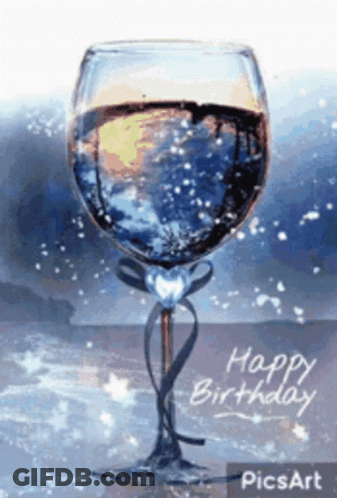 A Glass Of Wine With The Words Happy Birthday Written On It . GIF