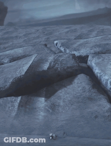 A Glowing Circle Is Surrounded By Rocks In A Dark Area GIF