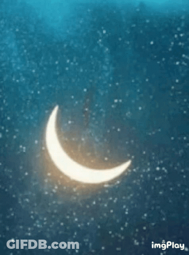 A Glowing Crescent Moon In A Starry Sky GIF