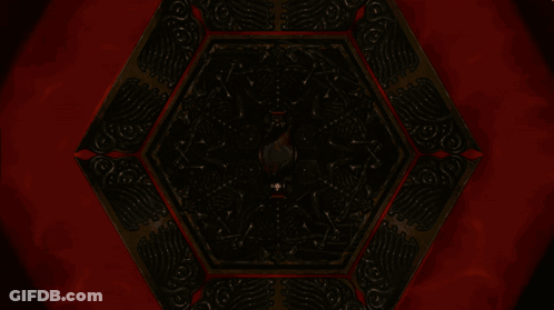 A Glowing Hexagon With The Letter A In The Middle GIF