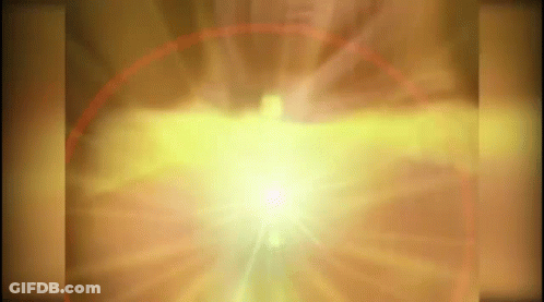 A Glowing Light Is Coming Out Of A Hole In A Wall GIF