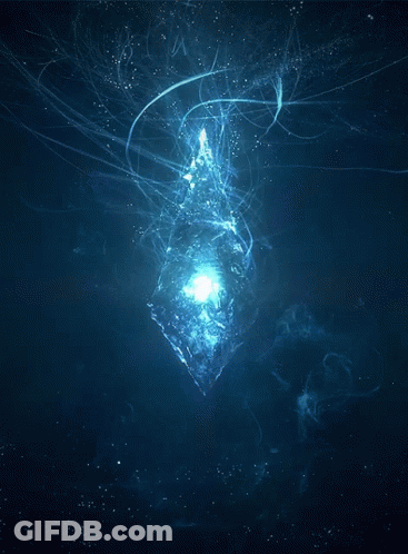 A Glowing Object Is Floating In The Dark GIF