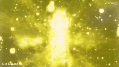 A Glowing Yellow Light Is Coming Out Of A Dark Background GIF