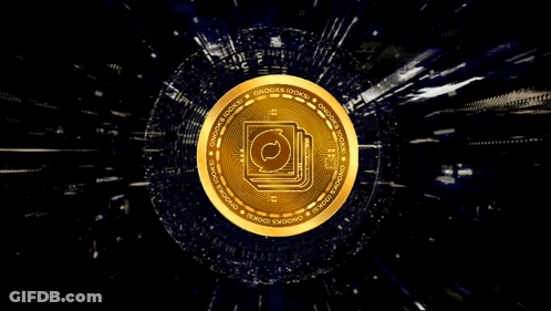 A Gold Coin That Says ' Clocks Looks ' On It GIF