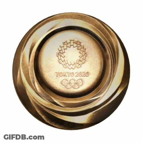A Gold Coin That Says Tokyo 2020 With A Wreath On It GIF