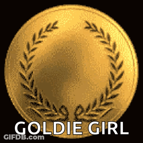 A Gold Coin With A Laurel Wreath Around It And The Words Goldie Girl Below It GIF
