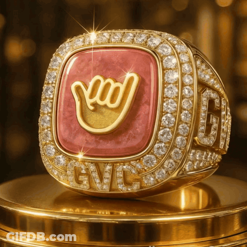 A Gold Ring With Gvc Written On The Bottom GIF