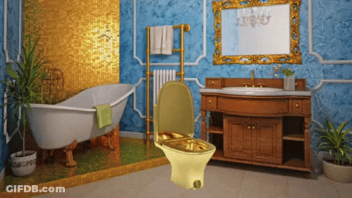 A Gold Toilet Sits In A Bathroom Next To A Bathtub And Sink GIF