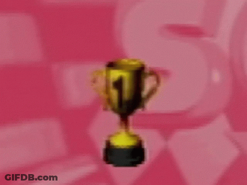 A Gold Trophy On A Pink Background With A Man In A Suit In The Background . GIF