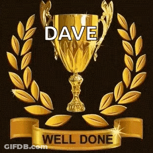 A Gold Trophy With A Laurel Wreath Around It And The Words `` Dave Well Done '' Written On It . GIF