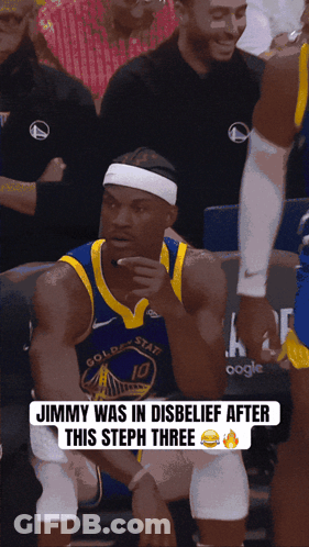 A Golden State Warriors Basketball Player Sitting In The Stands GIF