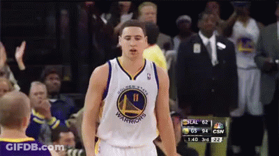 A Golden State Warriors Basketball Player Stands In Front Of The Crowd GIF