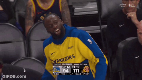 A Golden State Warriors Player Laughs In The Stands GIF