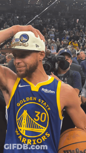 A Golden State Warriors Player Wearing A Hat GIF