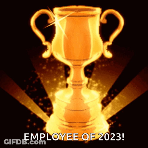 A Golden Trophy That Says Employee Of 2023 On The Bottom GIF