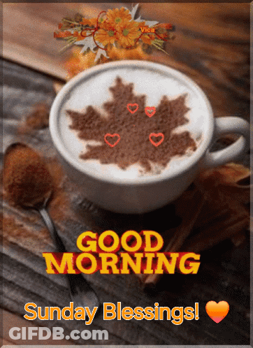 A Good Morning Sunday Blessings Card With A Cup Of Coffee On A Wooden Table GIF