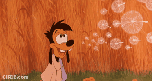 A Goofy Cartoon Character Blowing Dandelions With A Magnifying Glass On His Head GIF