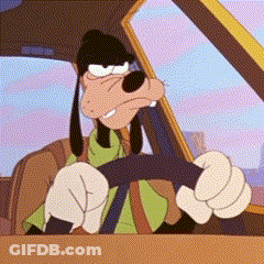 A Goofy Cartoon Character Is Driving A Car And Giving A Thumbs Up GIF