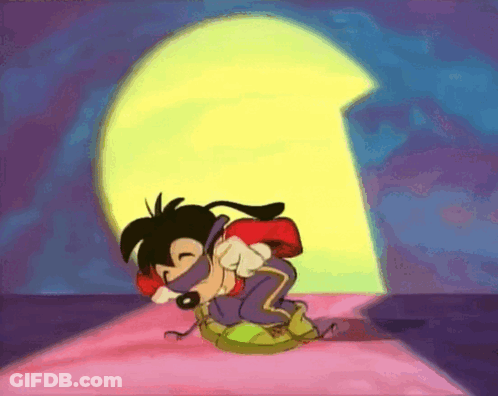 A Goofy Cartoon Character Is Kneeling Down In Front Of A Yellow Keyhole GIF